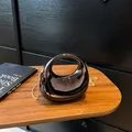Glossy black crescent handbag with mirror finish, gold chain strap, and hollow handle - Crescent Style (6154) / Gunmetal