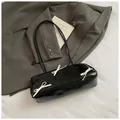 Black glossy underarm bag with three cream bows for a retro chic aesthetic look - Black without Pendant