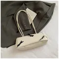 Cream rectangular baguette bag with black bows and thin double shoulder straps - White Without Pendant