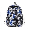 Student backpack with street graffiti print and astronaut keychain in black and blue - Navy Blue