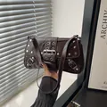 Dark brown patent leather shoulder bag with punk silver studs and Y2K metal eyelets - Coffee