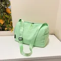 Light green nylon large capacity shoulder bag with double zippers and adjustable strap - Green