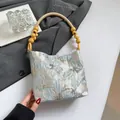 Borsa a mano con ricamo a farfalla stile cinese e manico con perline in tessuto jacquard - Stile Floreale Blu