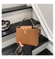 Brown woven bucket bag with gold V logo and adjustable shoulder strap for casual wear - Brown