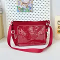 Red nylon ita bag with large transparent PVC window and adjustable wide shoulder strap - Burgundy