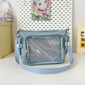 Light blue crossbody ita bag with clear PVC window and adjustable strap for students - Blue