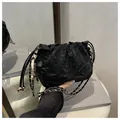 Elegant black pleated drawstring bucket bag with gold chain strap for women - Black