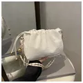 White marble-textured drawstring cloud bag with a gold chain strap for women - White