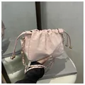 Pink marble texture bucket bag with drawstring closure and golden chain strap - Pink