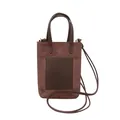 Brown suede minimalist crossbody phone bag with top handles and front pocket - Brown