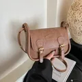 Retro brown PU leather saddle crossbody bag with fashion embossed logo and gold buckles - Khaki