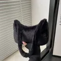 Chic black faux fur underarm bag with plush shoulder strap for autumn and winter fashion - Black