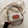 Retro cremefarbene und braune Monogramm Umhängetasche mit goldenen Details - Weiß