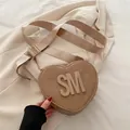 Beige heart-shaped PU leather crossbody bag with wide strap and embossed SM logo - Khaki