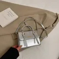 Glossy silver crossbody bag with metal texture and top handle in fashion style - Without Pendant / Silver