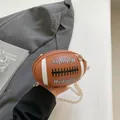 Brown rugby shaped PU leather crossbody bag with gold chain strap and white stitching - Brown Small