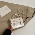 Chic cream white leather handbag with gold buckle and fashion text in Korean style - Without Pendant / White