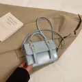 Light blue square textured PU handbag with gold hardware and fashion lettering - Without Pendant / Blue