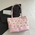 Borsa tote in velluto a coste rosa con stampa a ciliegie e dettagli in ecopelle - Rosa