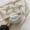 Mini silver shell bag with white pearl handle and gold metal chain strap for women - Silver