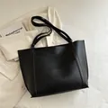 Minimalist large black tote bag in matte synthetic leather with long double shoulder straps - Black