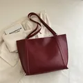 Chic burgundy matte faux leather tote bag with vertical strap design and large capacity - Red