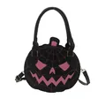 Halloween pumpkin handbag in black with pink spider web patterns and shoulder strap - Black & Pink