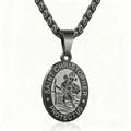 Close-up of black stainless steel Saint Christopher pendant with engraved details - Wheat Chain Necklace / Black