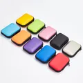 Colorful portable EVA storage cases for earphones and cables in ten various vibrant colors - Black