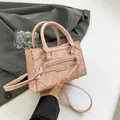 Chic pink marble texture crossbody handbag with leather tassels and silver zippers - Pink