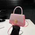 Borsa a tracolla rosa con strass per donna con chiusura dorata e cinturino in pelle - Rosa