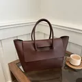 Minimalist large-capacity deep brown tote bag in matte leather for daily commuting - Brown