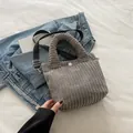 Gray corduroy tote bag with white snap button and adjustable crossbody strap - Gray