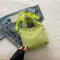 Neon green corduroy small tote bag with a detachable strap and a single white button - Kiwi Green