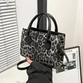 Chic leopard print crossbody handbag with black top handle and elegant gold hardware - No Pendant / Black
