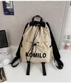 Close-up of lightweight drawstring backpack with front zip pocket and KOMILO logo - Small / Single Bag / Off White