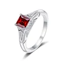 S925 sterling silver ring featuring a red princess cut stone and side diamond accents - Size 5 / Garnet Red