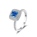 Detail of princess cut blue moissanite ring with double halo in 925 silver - Size 5 / Sapphire Blue