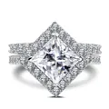 Macro shot of 3CT princess cut cubic zirconia ring with double band and halo setting - Size 6 / White