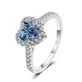 Detailed macro shot of blue heart moissanite ring with S925 sterling silver hallmark - Gray