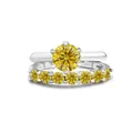 Macro shot of S925 sterling silver stamp and yellow moissanite stone on the ring set - Gold Yellow