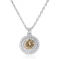 Macro shot of 1ct champagne moissanite pendant with double halo and sparkling accents - 1 Carat 6.5mm / Original Yellow