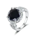 Macro detail of S925 silver ring featuring a 5-carat black moissanite stone in halo setting - Size 5 / Black