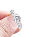 Blue moissanite ring with six-prong silver setting and double row pave diamond band - US 5 / White