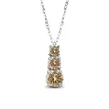 Macro view of three champagne moissanite stones in graduated sizes on a silver pendant - 1 Carat 6.5mm / Original Yellow