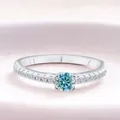 Classic S925 sterling silver ring featuring a vibrant round blue moissanite stone - US 5 / Original Blue