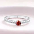 S925 sterling silver ring with a vibrant red round gemstone and pavé white zircons - Garnet Red