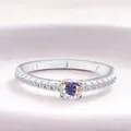 S925 sterling silver ring featuring a round moissanite with sparkling rainbow fire - AB Rainbow