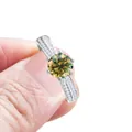 Elegant silver ring with a large yellow-green moissanite and double row diamond band - Yellow-Green
