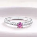 Classic S925 sterling silver ring with a round pink stone and diamond side stones - Pink